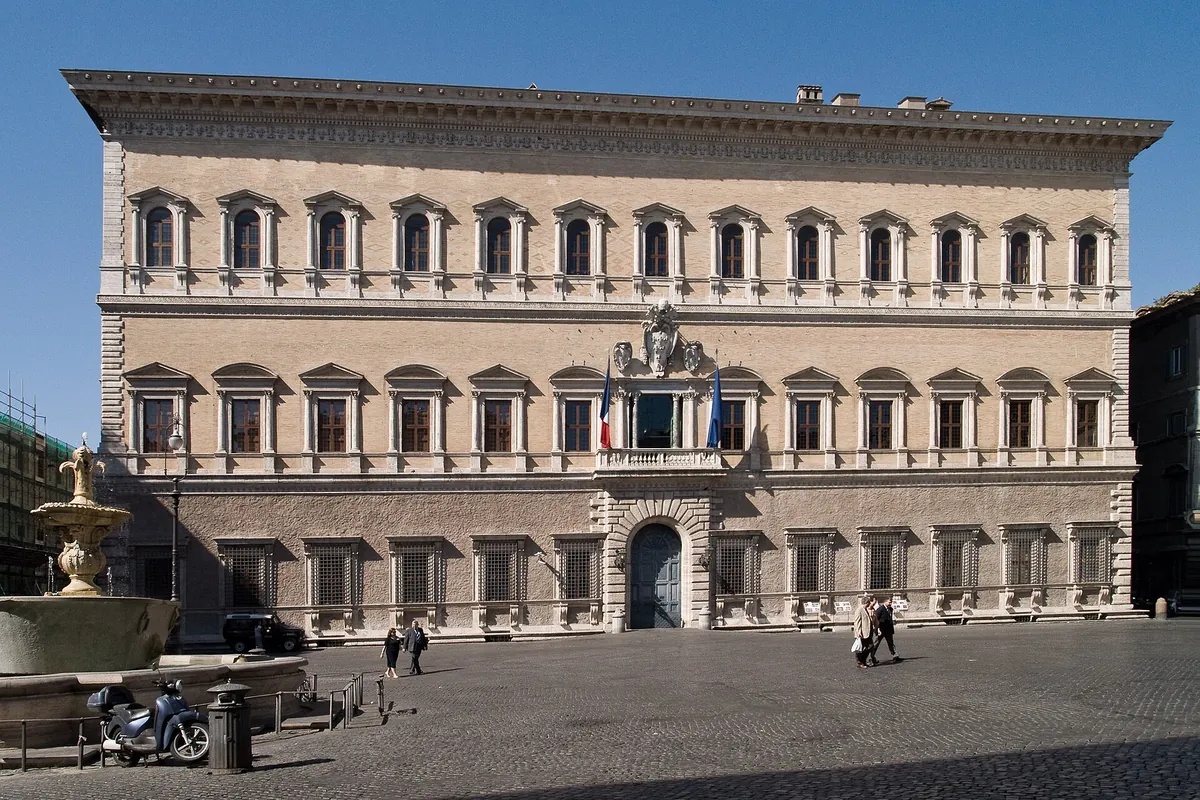 The long Renaissance front of the Palazzo Farnese in Rome, with rows of windows above a rusticated ground floor; Act 2 of Tosca is set in Scarpia's rooms here.